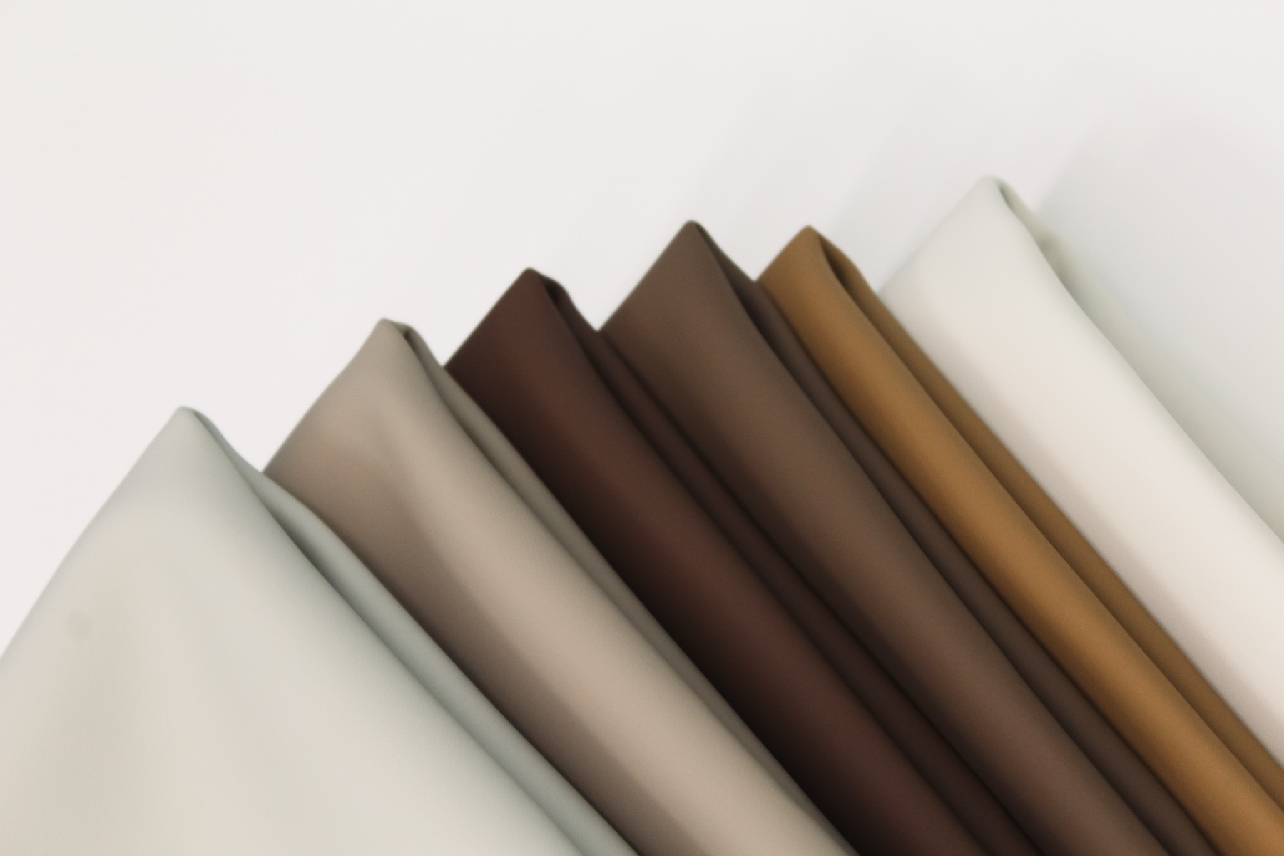 Cartela de Silion em tons neutros, do off-white ao caramelo